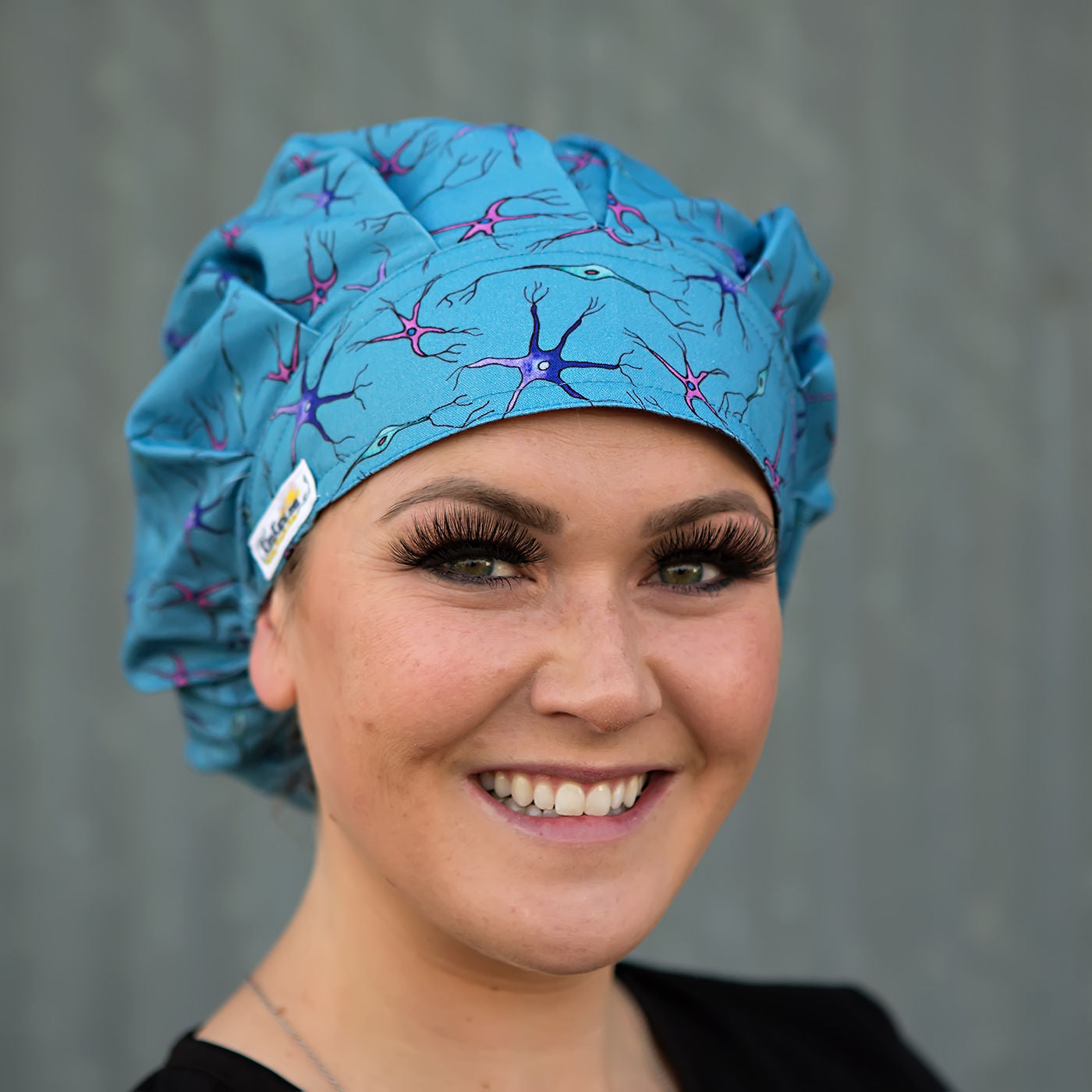 bouffant style scrub cap with neurons