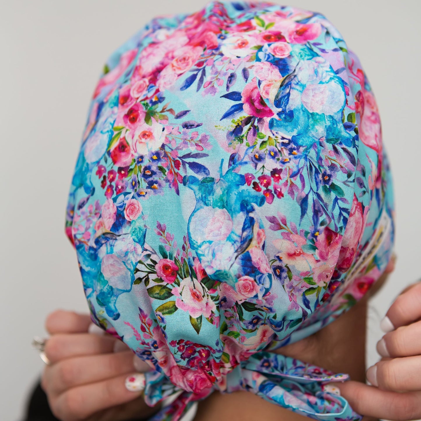 scrub cap with anatomical hearts and flowers