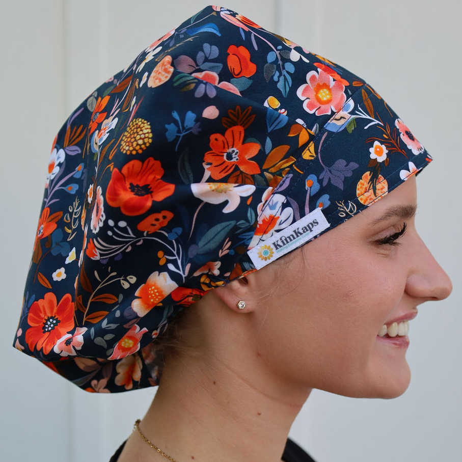 navy and orange floral scrub cap in bouffant style