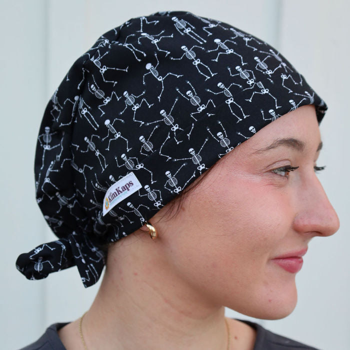 tieback scrub cap with skeletons on black