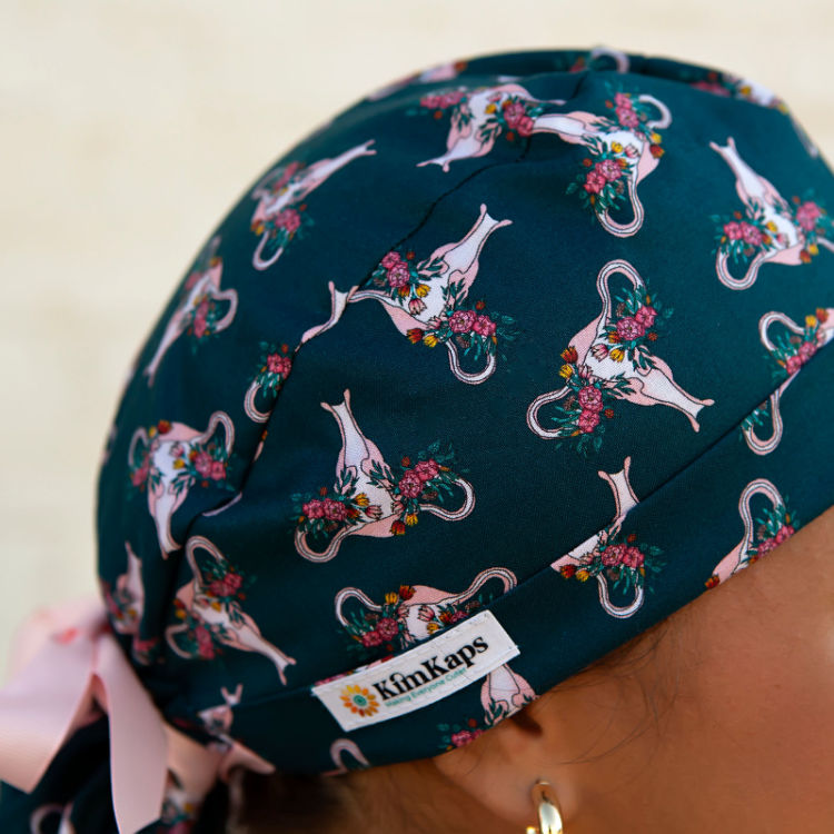 ponytail scrub cap with uteruses and flowers