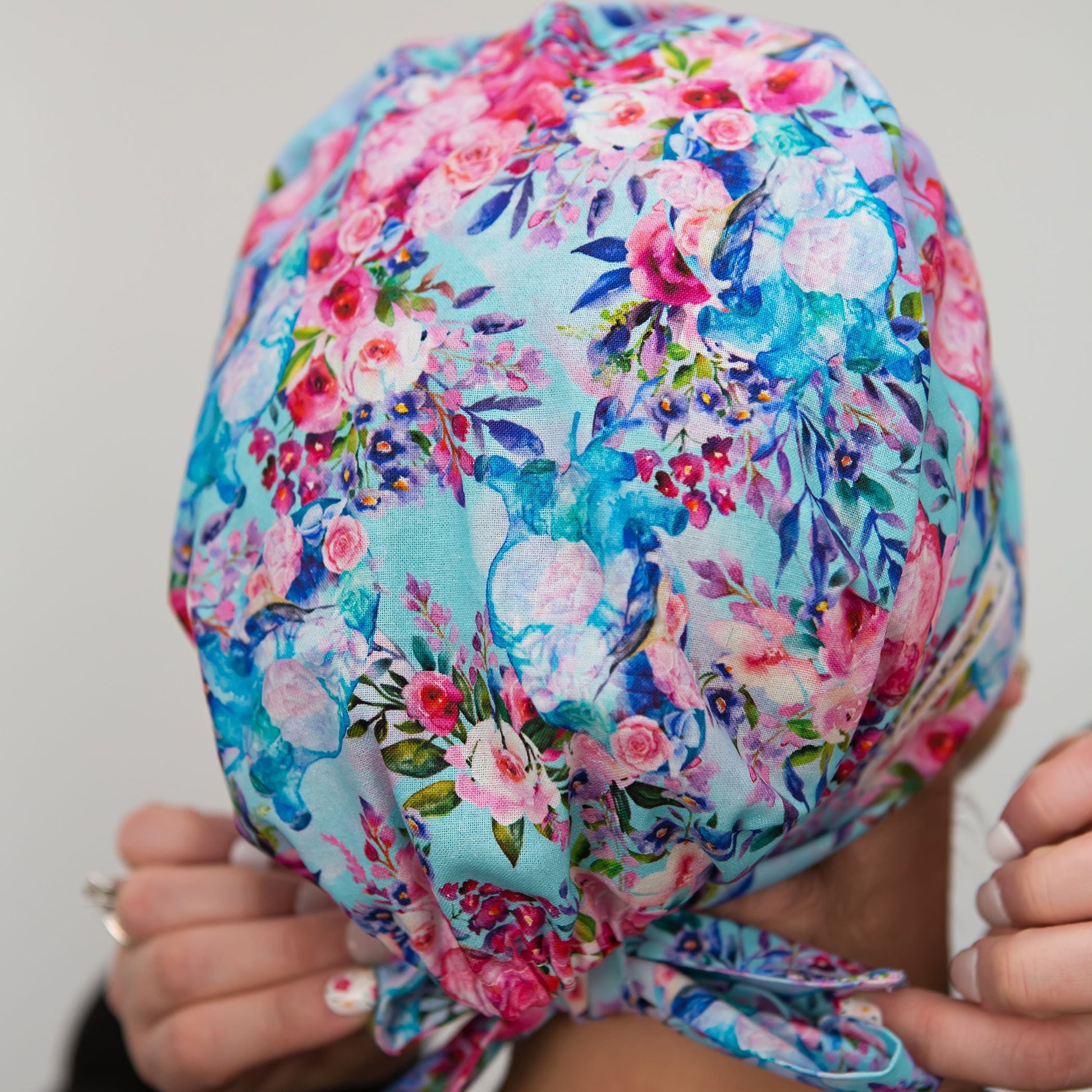 scrub cap with anatomical hearts and flowers