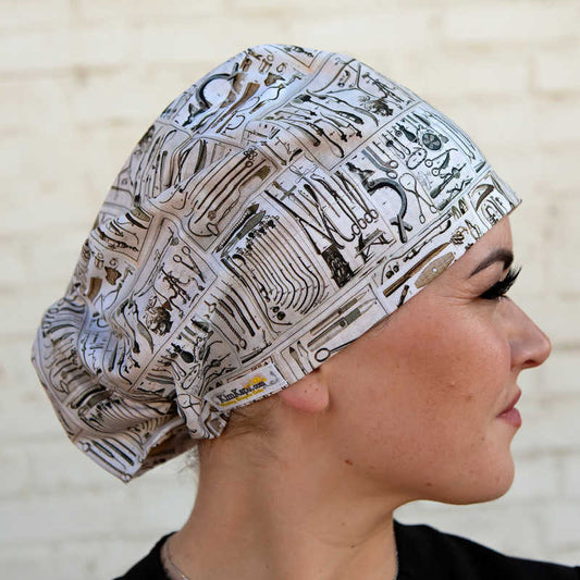 euro scrub cap with vintage surgical instruments