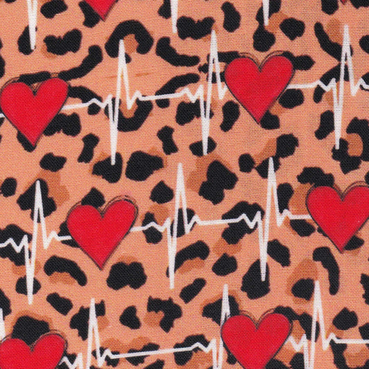 surgical scrub cap with leopard print and hearts