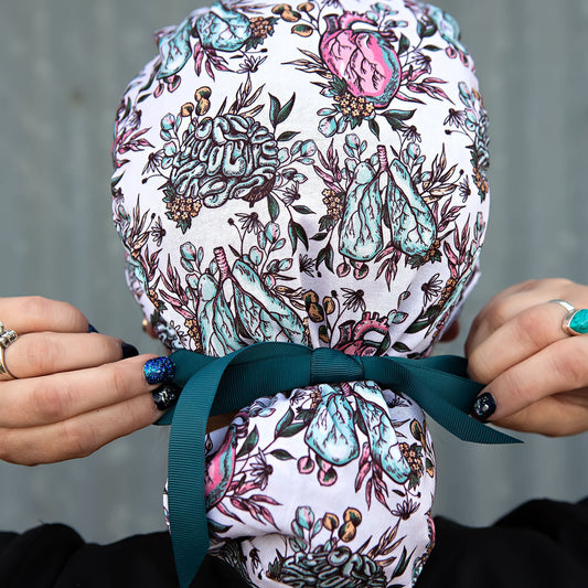 ponytail style scrub cap with hearts brains and lungs